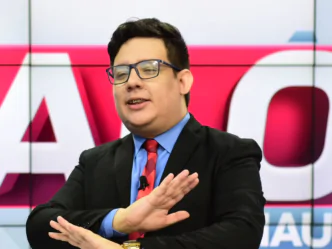 Jornalista e apresentador Erlan Bastos